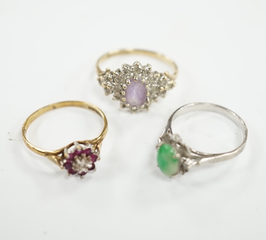 A mid 20th century 18k, jade and diamond cluster set ring, size I, gross weight 1.5 grams, together with two modern 9ct gold and gem set rings, gross weight 3.2 grams. Condition - fair